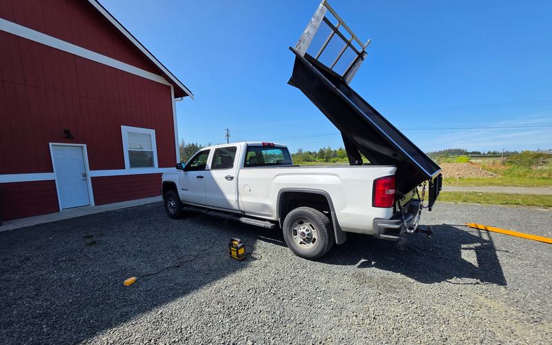 Titan 6K Dump Insert raised on a pickup